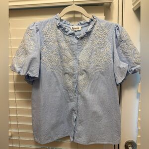 Denim embroidered top.